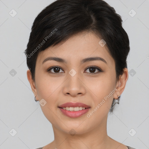 Joyful asian young-adult female with short  brown hair and brown eyes