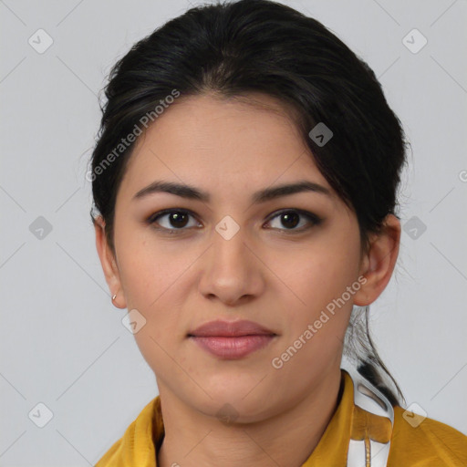 Joyful latino young-adult female with medium  brown hair and brown eyes