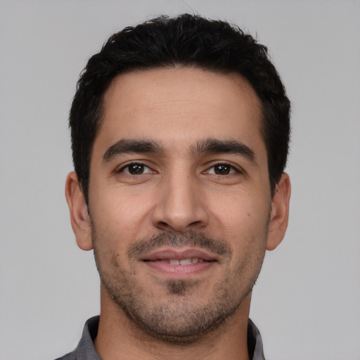 Neutral white young-adult male with short  black hair and brown eyes