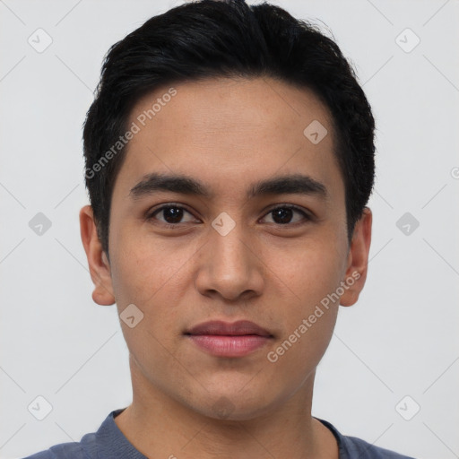 Joyful asian young-adult male with short  black hair and brown eyes