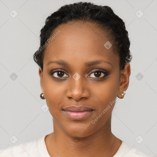 Joyful black young-adult female with short  brown hair and brown eyes