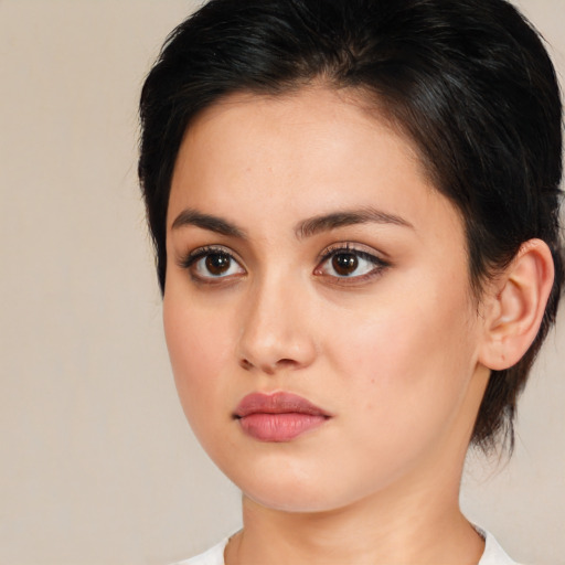 Neutral white young-adult female with medium  brown hair and brown eyes