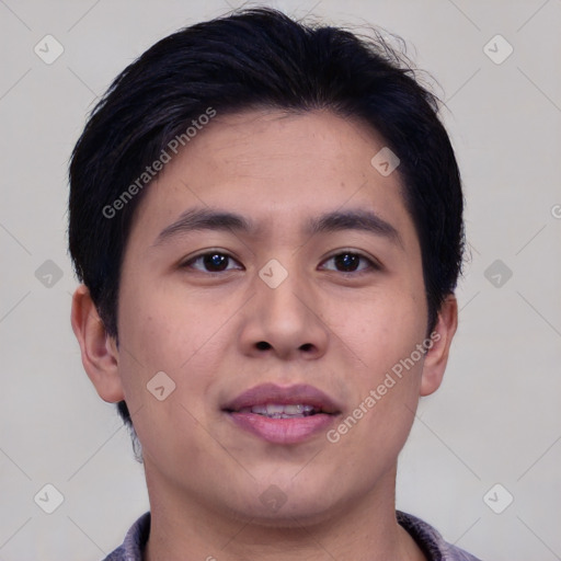 Joyful asian young-adult male with short  brown hair and brown eyes