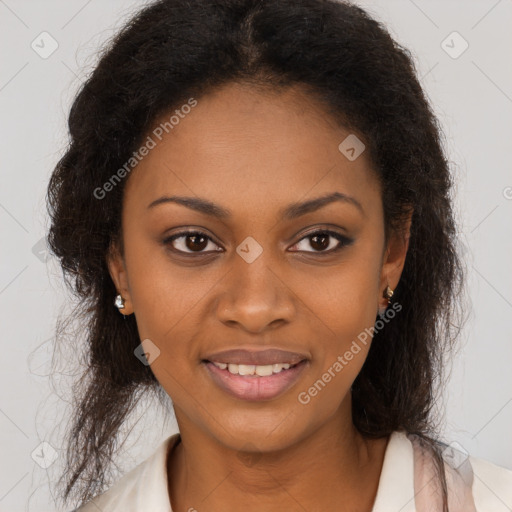 Joyful black young-adult female with long  brown hair and brown eyes