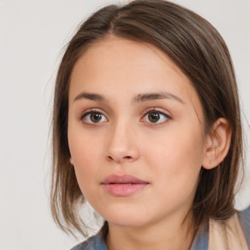 Neutral white young-adult female with medium  brown hair and brown eyes