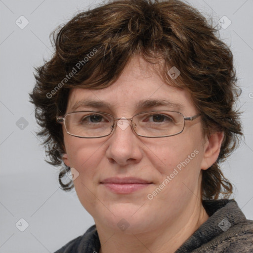 Joyful white adult female with medium  brown hair and blue eyes