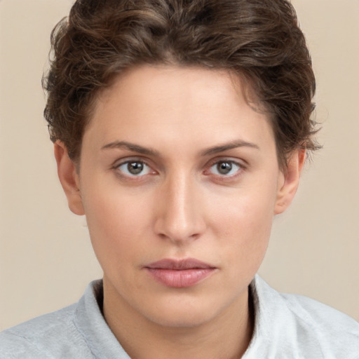 Neutral white young-adult female with short  brown hair and brown eyes