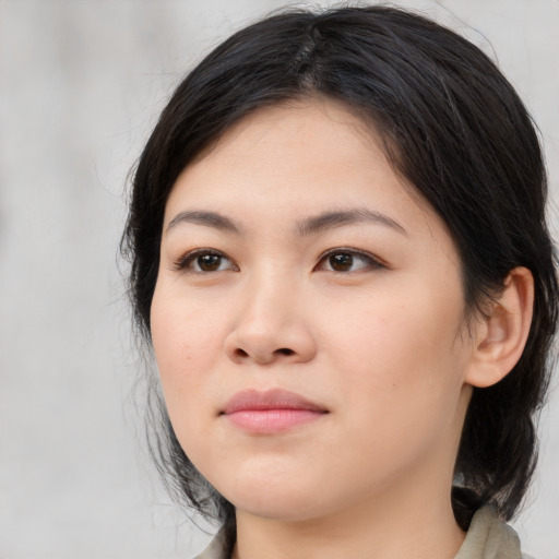 Neutral asian young-adult female with medium  black hair and brown eyes