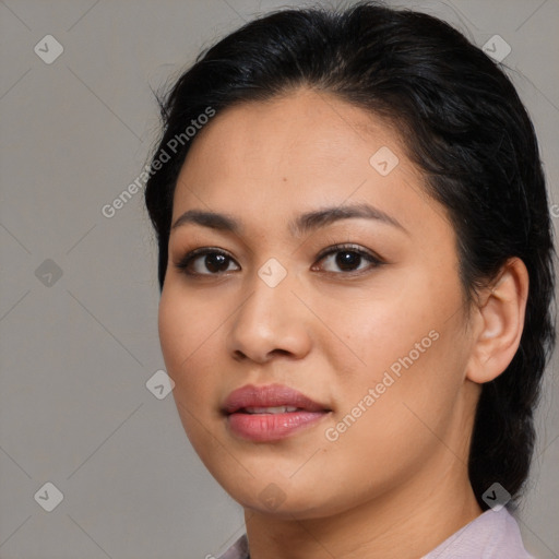 Joyful asian young-adult female with medium  brown hair and brown eyes