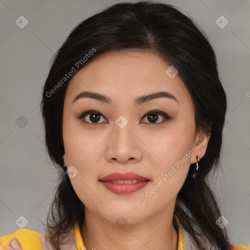 Joyful latino young-adult female with medium  brown hair and brown eyes