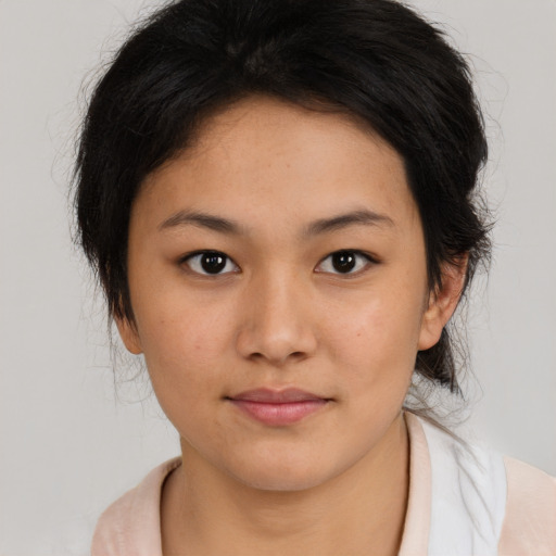 Neutral asian young-adult female with medium  brown hair and brown eyes