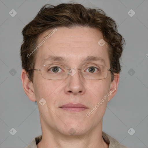 Joyful white adult male with short  brown hair and grey eyes