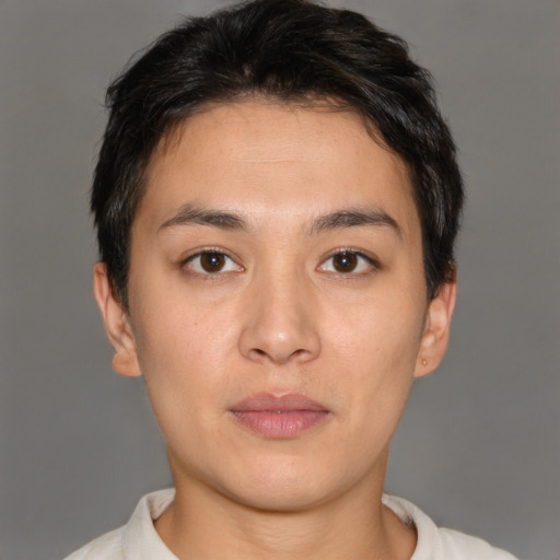 Neutral white young-adult female with short  brown hair and brown eyes