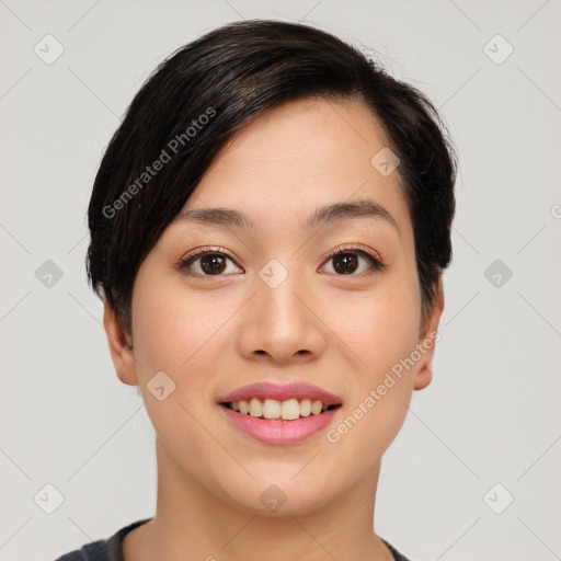 Joyful asian young-adult female with short  black hair and brown eyes