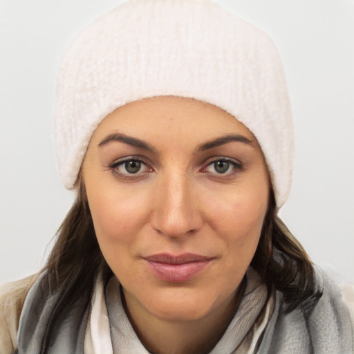 Joyful white young-adult female with medium  black hair and brown eyes