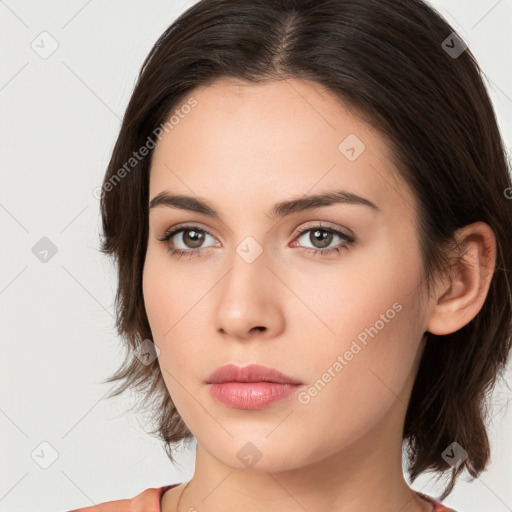 Neutral white young-adult female with medium  brown hair and brown eyes