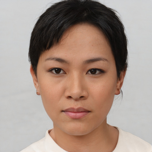 Neutral asian young-adult female with short  black hair and brown eyes