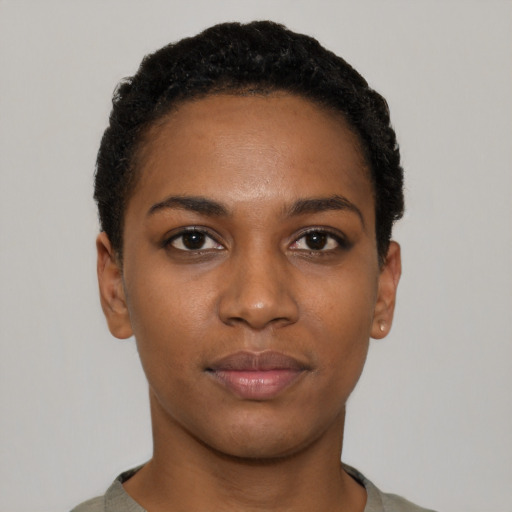 Neutral black young-adult female with short  black hair and brown eyes