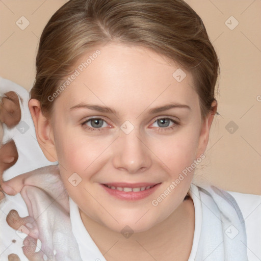 Joyful white young-adult female with medium  brown hair and blue eyes