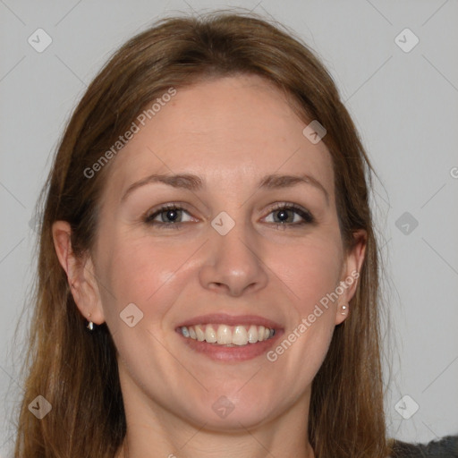 Joyful white young-adult female with long  brown hair and grey eyes