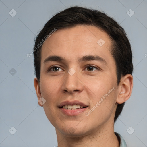 Joyful white young-adult male with short  brown hair and brown eyes