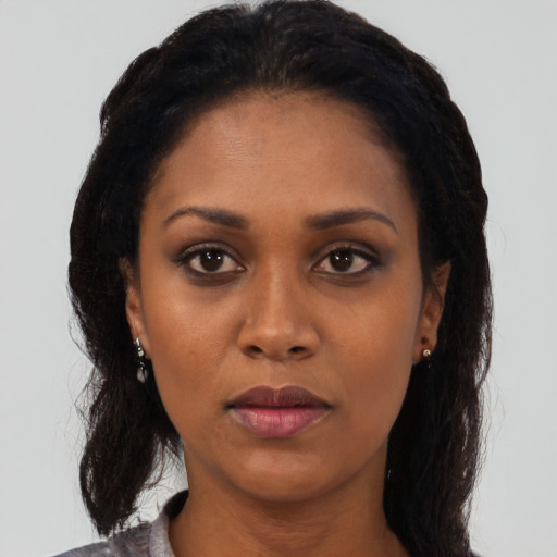 Neutral black young-adult female with short  black hair and brown eyes