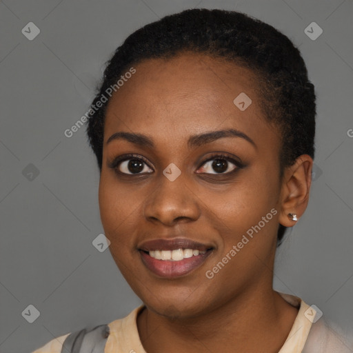 Joyful latino young-adult female with short  black hair and brown eyes