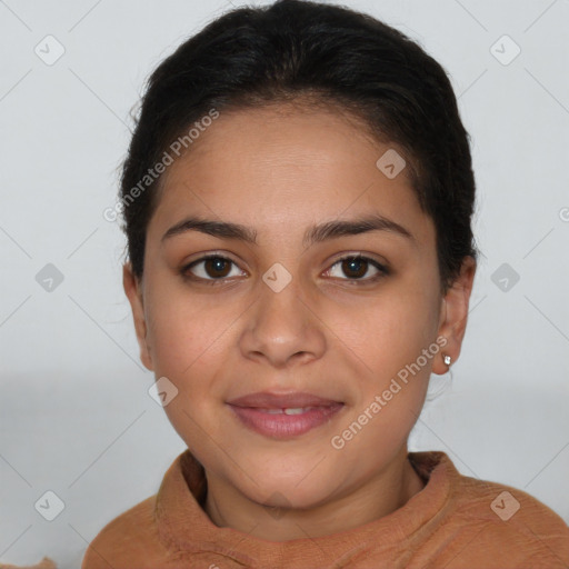 Joyful latino young-adult female with short  brown hair and brown eyes