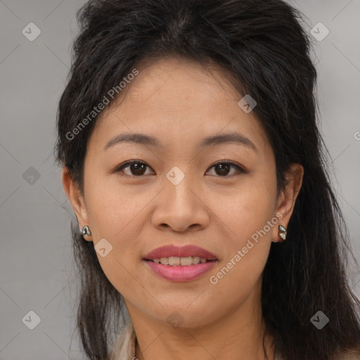 Joyful asian young-adult female with long  brown hair and brown eyes