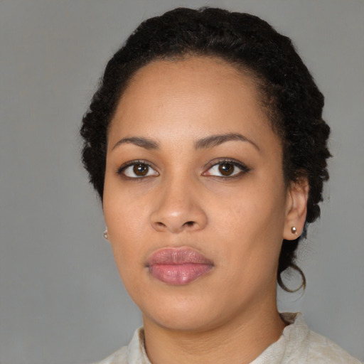 Neutral black young-adult female with short  black hair and brown eyes