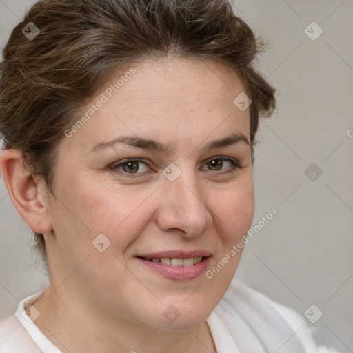 Joyful white adult female with short  brown hair and brown eyes