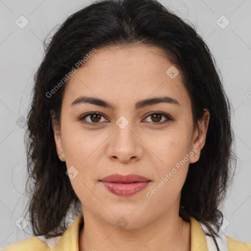 Joyful latino young-adult female with medium  brown hair and brown eyes