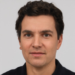 Neutral white adult male with short  brown hair and brown eyes