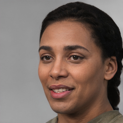 Joyful white young-adult female with short  black hair and brown eyes