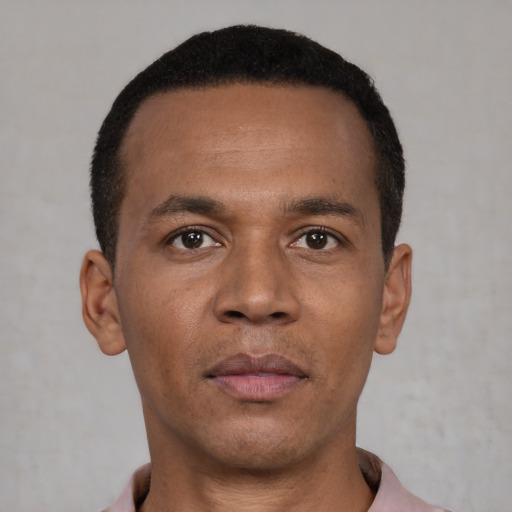 Neutral black young-adult male with short  black hair and brown eyes