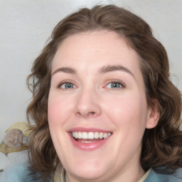 Joyful white young-adult female with medium  brown hair and blue eyes