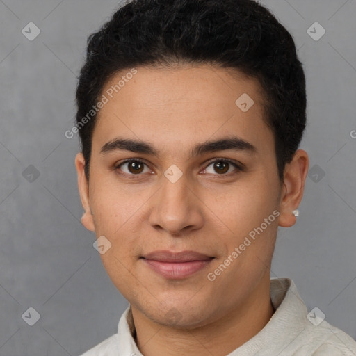 Joyful latino young-adult male with short  brown hair and brown eyes