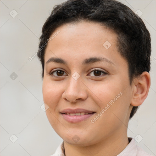 Joyful white young-adult female with short  brown hair and brown eyes