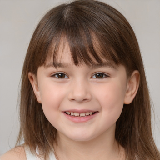 Joyful white child female with medium  brown hair and brown eyes