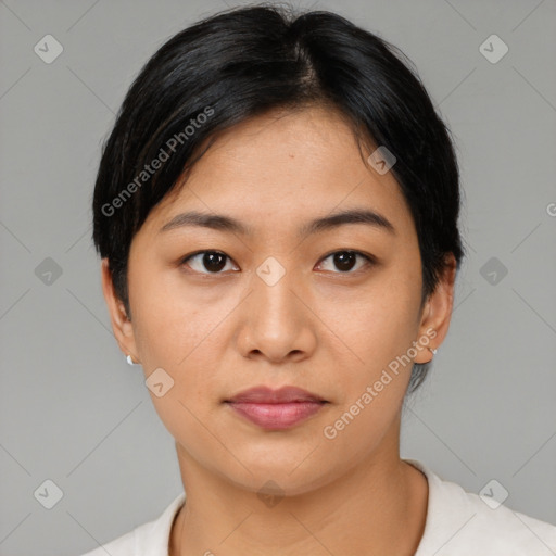 Joyful asian young-adult female with medium  black hair and brown eyes