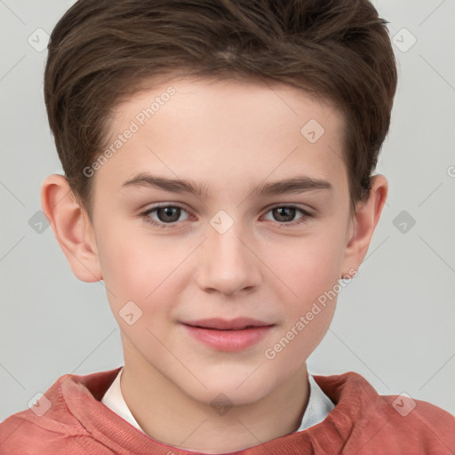 Joyful white child male with short  brown hair and grey eyes