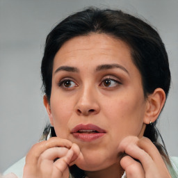 Neutral white young-adult female with short  brown hair and brown eyes