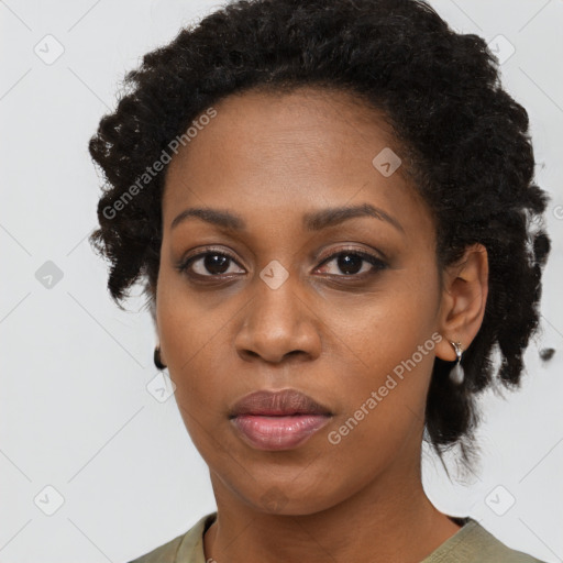 Joyful black young-adult female with medium  black hair and brown eyes