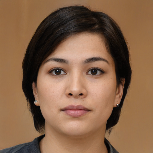 Neutral asian young-adult female with medium  black hair and brown eyes