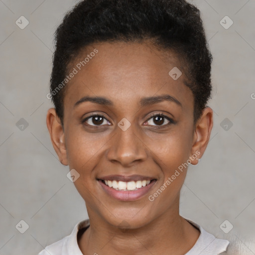 Joyful black young-adult female with short  brown hair and brown eyes