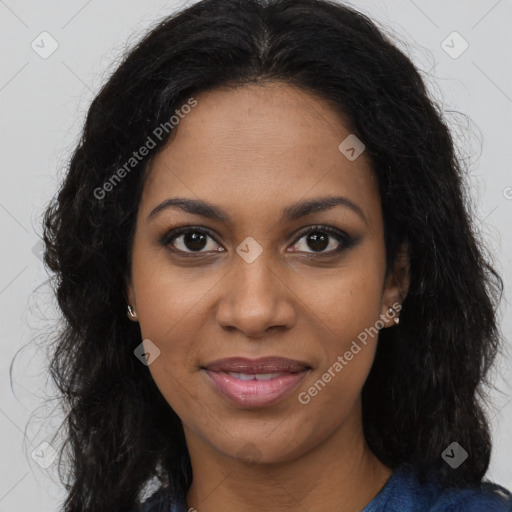 Joyful black young-adult female with long  brown hair and brown eyes