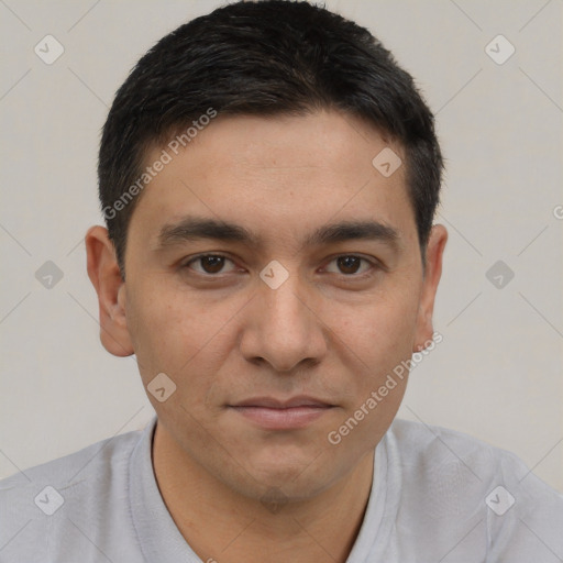 Joyful white young-adult male with short  black hair and brown eyes