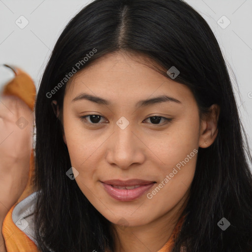 Joyful asian young-adult female with long  brown hair and brown eyes