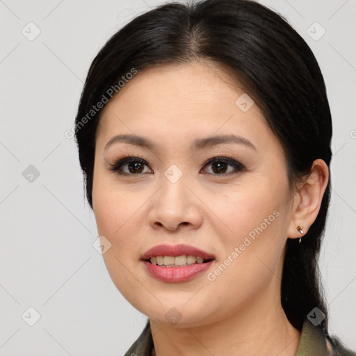 Joyful asian young-adult female with medium  brown hair and brown eyes