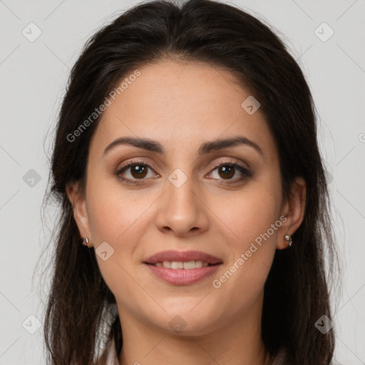 Joyful white young-adult female with long  brown hair and brown eyes